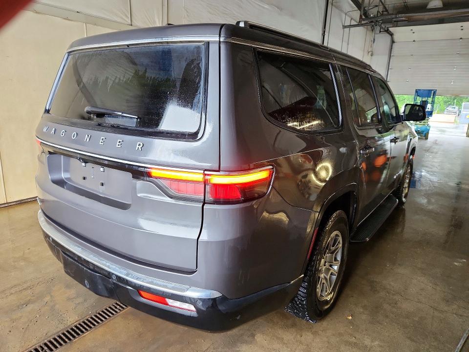 2023 Jeep Grand wagoneer VIN 1C4SJVAT6PS526157 COPART salvage auction — NORMAL WEAR, Ak - Certificate Of Vehicle Title, sold $39,750 on 2026-08-04 (photo 3)