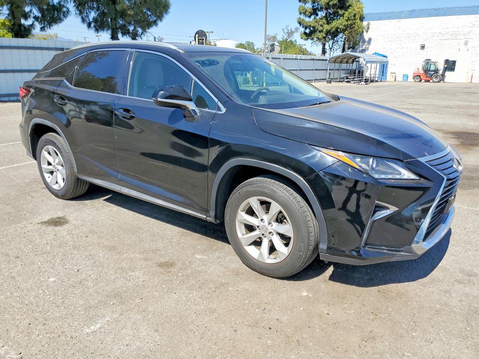 2016 Lexus Rx VIN 2T2ZZMCA6GC017907 COPART salvage auction — NORMAL WEAR, CA - DIS/DLR/EXP ONLY CLEAN TITLE, sold $9,200 on 2026-07-16 (photo 4)