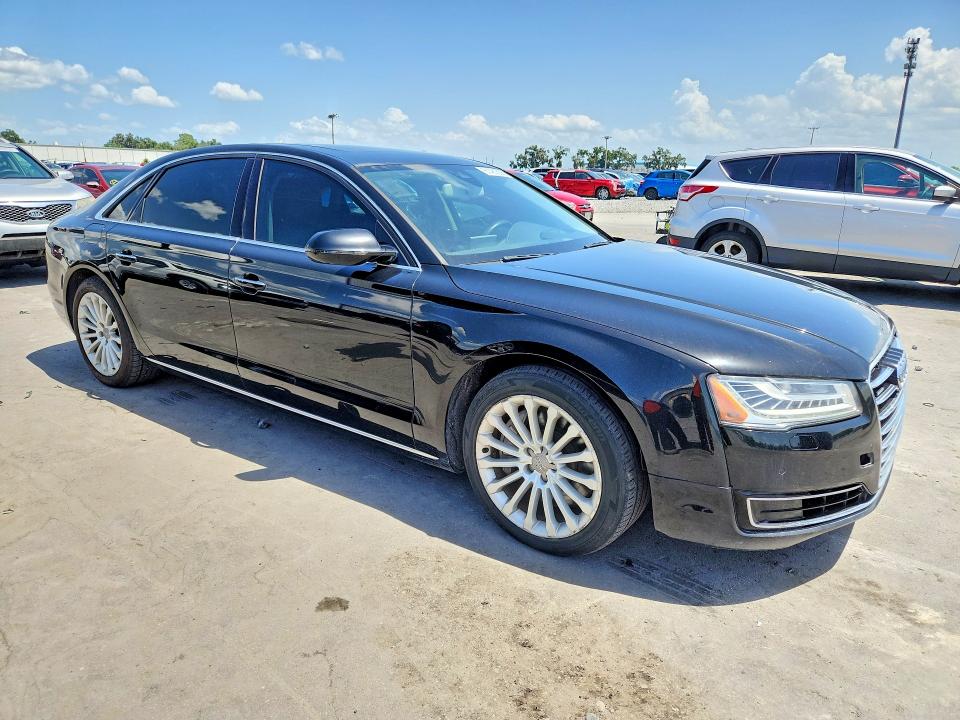 2016 Audi A8 VIN WAU34AFD7GN014621 COPART salvage auction — NORMAL WEAR, Fl - Certificate Of Title, sold $900 on 2026-07-29 (photo 4)