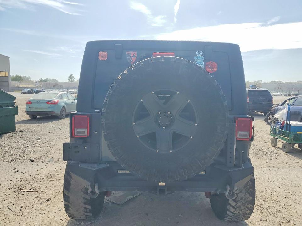 2014 Jeep Wrangler / VIN 1C4BJWDG5EL312868 COPART salvage auction — SIDE, Ks - Cert Of Title-Salvage, sold $3,100 on 2026-07-28 (photo 6)