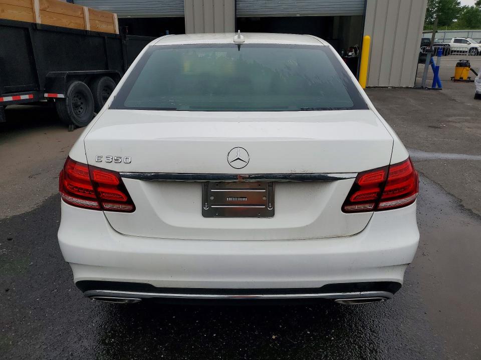 2014 Mercedes-benz E-klasse VIN WDDHF5KBXEA977554 COPART salvage auction — NORMAL WEAR, Wv - Certificate Of Title, sold $100 on 2026-07-28 (photo 6)