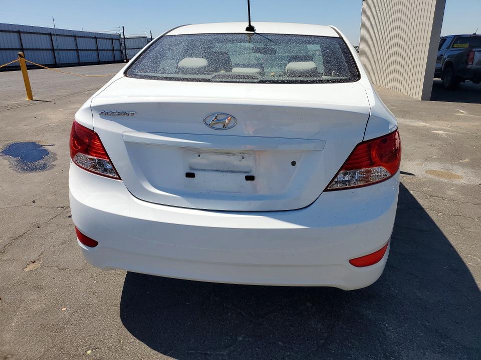 2014 Hyundai Accent VIN KMHCT4AE6EU598094 COPART salvage auction — Burn Engine, Ca - Dis/Dlr/Exp Only Clean Title, sold $325 on 2026-07-13 (photo 6)