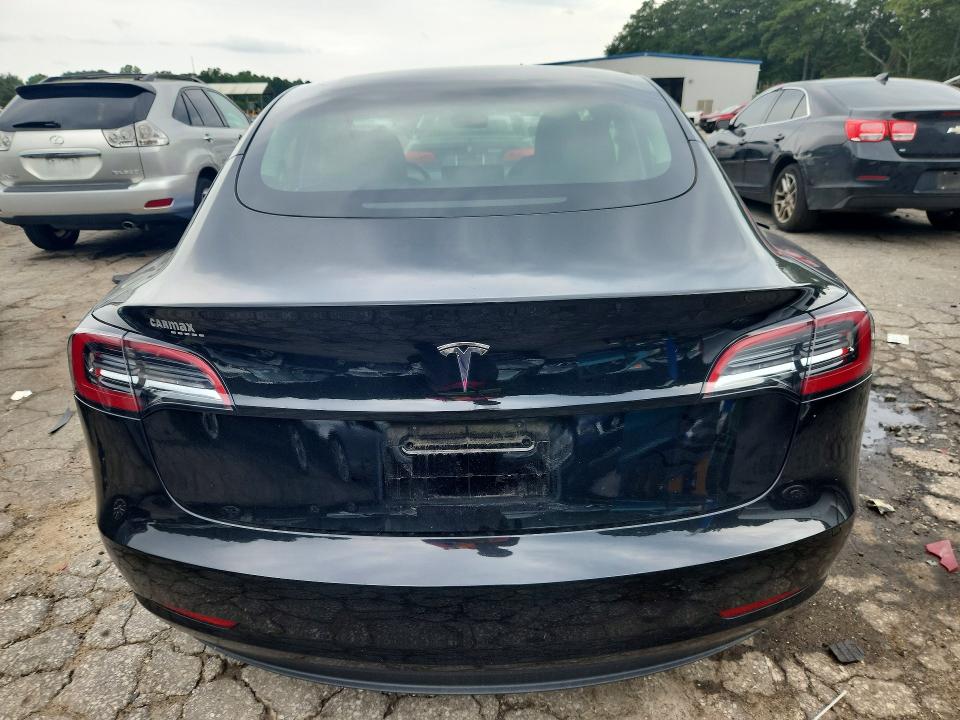 2023 Tesla Model 3 VIN 5YJ3E1EA9PF668011 COPART salvage auction — SIDE, Ga - Certificate Of Title, sold $14,600 on 2026-07-31 (photo 6)