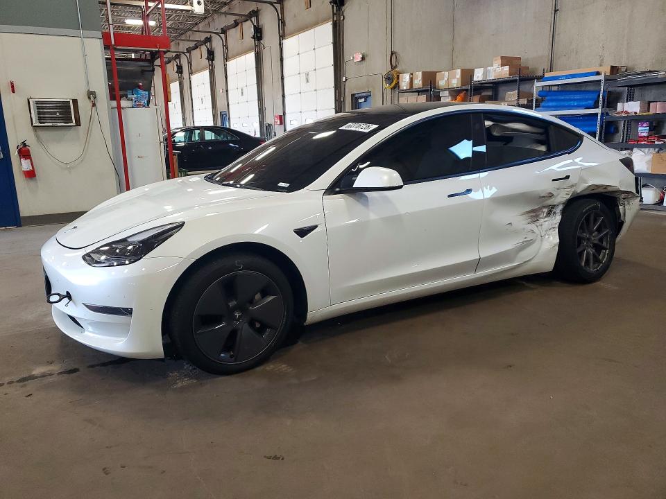 2023 Tesla Model 3 VIN 5YJ3E1EA9PF580382 — COPART salvage auction photo