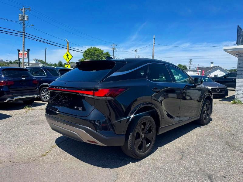 2023 Lexus Rx 350 VIN 2T2BAMCA2PC026452 COPART salvage auction — NORMAL WEAR, TX - CERT OF TITLE-REBUILT SALVAGE (P), sold $30,250 on 2026-07-28 (photo 4)