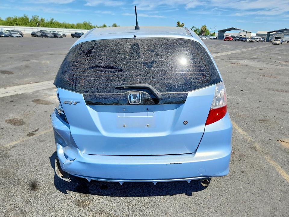 2009 Honda Fit VIN JHMGE88269S021889 COPART salvage auction — SIDE, CA - SALVAGE CERTIFICATE, sold $600 on 2026-07-13 (photo 6)