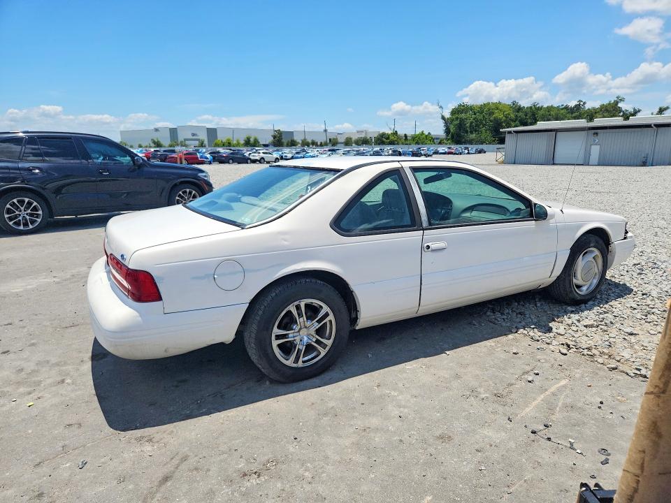 1996 Ford Thunderbird VIN 1FALP62W4TH154400 COPART salvage auction — FRONT END, Fl - Certificate Of Title (P), sold $400 on 2026-07-08 (photo 3)