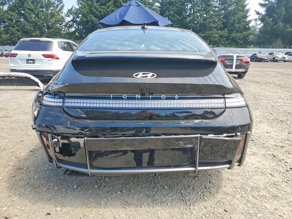 2025 Hyundai Ioniq 6 VIN KMHM24AC8SA098876 COPART salvage auction — REAR END, WA - BILL OF SALE, sold $9,900 on 2026-08-21 (photo 6)