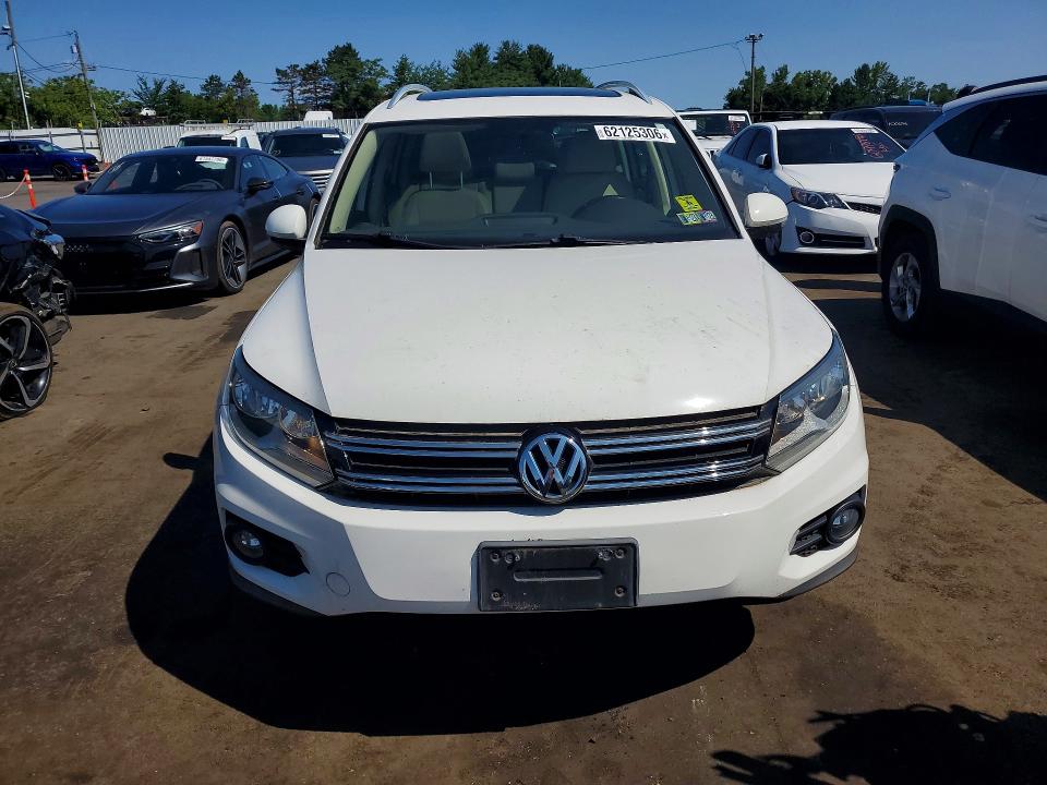 2014 Volkswagen Tiguan VIN WVGBV3AX2EW523382 COPART salvage auction — MINOR DENT/SCRATCHES, Ct - Certificate Of Title, sold $800 on 2026-07-28 (photo 5)