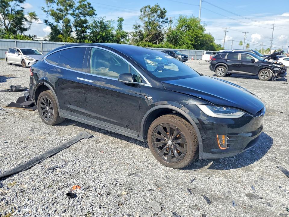 2020 Tesla Model x VIN 5YJXCAE23LF296014 COPART salvage auction — REAR END, FL - CERT OF TITLE SLVG REBUILDABLE, sold $20 on 2026-07-31 (photo 4)