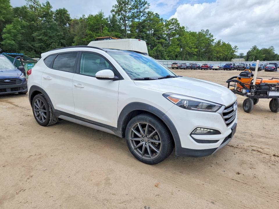 2018 Hyundai Tucson VIN KM8J33A23JU806255 COPART salvage auction — MINOR DENT/SCRATCHES, Tx - Certificate Of Title, sold $90 on 2026-07-24 (photo 4)