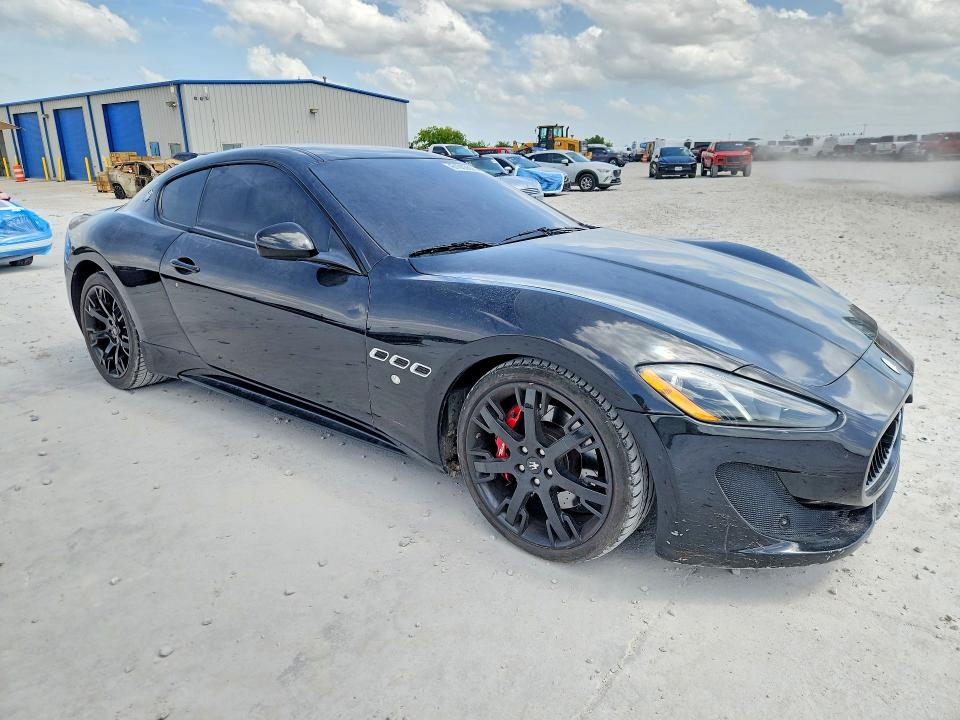 2014 Maserati Granturismo VIN ZAM45VLA1E0079444 COPART salvage auction — NORMAL WEAR, TX - CERT OF TITLE-REBUILT SALVAGE, sold $14,000 on 2026-07-31 (photo 4)