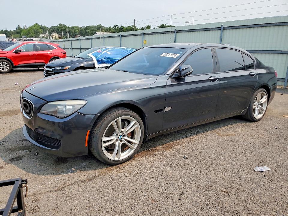 2013 BMW 7er VIN WBAYE4C58DD136987 COPART salvage auction — MINOR DENT/SCRATCHES, Fl - Cert Of Title Slvg Rebuildable, sold $2,950 on 2026-07-24 (photo 1)
