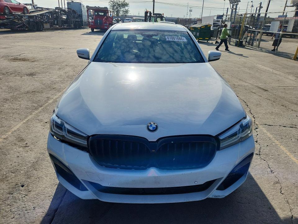 2023 BMW M5 VIN WBA13BK06PCM40203 COPART salvage auction — REAR END, CA - DIS/DLR/EXP ONLY CLEAN TITLE, sold $20,600 on 2026-07-29 (photo 5)