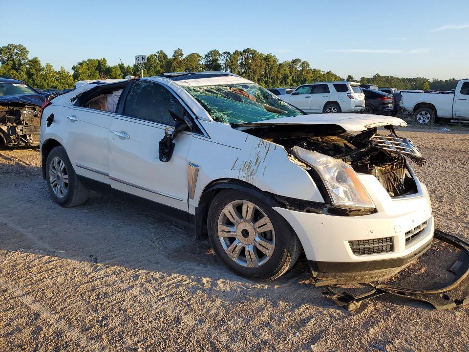 2015 Cadillac Srx VIN 3GYFNBE3XFS532104 COPART salvage auction — ROLLOVER, Tx - Salvage Vehicle Title, sold $225 on 2026-07-17 (photo 4)