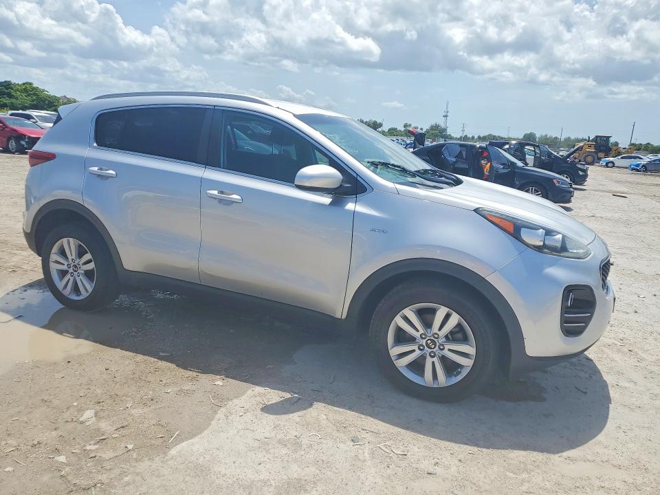 2018 Kia Sportage VIN KNDPMCAC5J7446196 COPART salvage auction — MINOR DENT/SCRATCHES, Fl - Certificate Of Title, sold $3,000 on 2026-07-28 (photo 4)