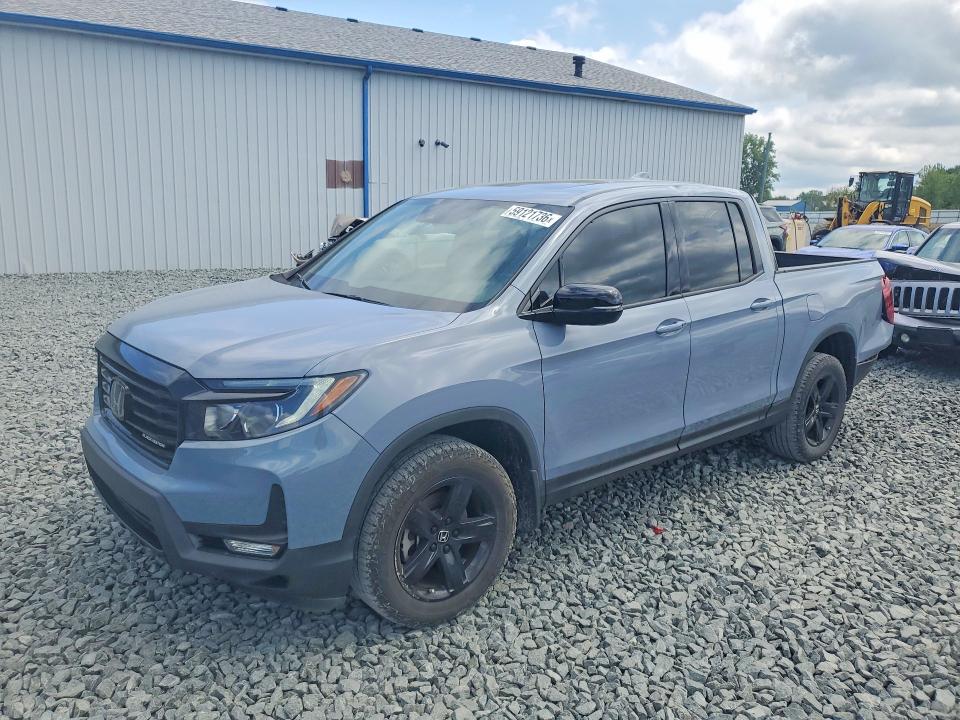2023 Honda Ridgeline VIN 5FPYK3F83PB033864 — COPART salvage auction photo