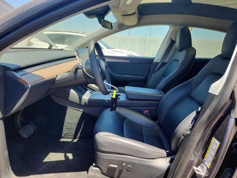 2023 Tesla Model y VIN 7SAYGDEE8PF918877 COPART salvage auction — REAR END, CA - SALVAGE CERTIFICATE, sold $15,700 on 2026-07-24 (photo 7)