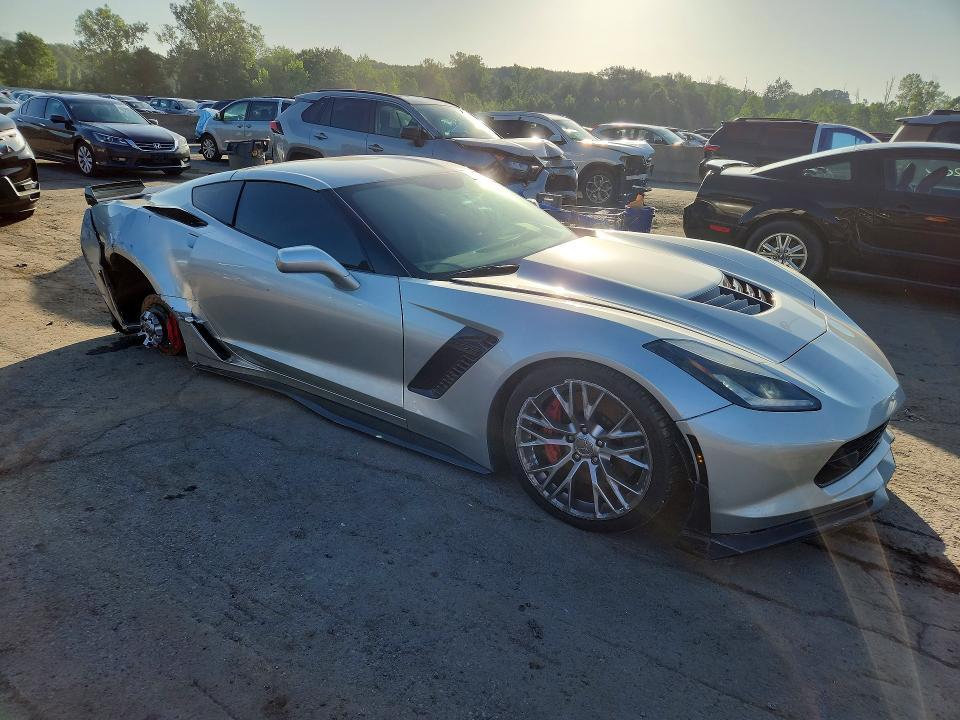 2015 Chevrolet Corvette VIN 1G1YT2D60F5600980 COPART salvage auction — REAR END, NY - MV-907A SALVAGE CERTIFICATE, sold $25,000 on 2026-07-09 (photo 4)