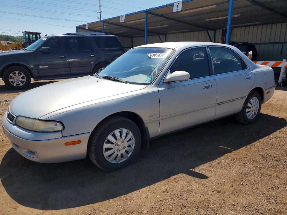 1993 Mazda 626 VIN 1YVGE22A8P5238140 COPART salvage auction — MINOR DENT/SCRATCHES, Co - Dis/Dlr/Exp Only Clean Title, sold $250 on 2026-07-22 (photo 1)