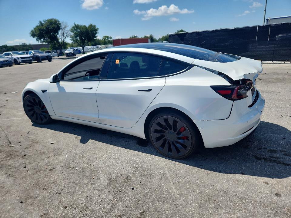 2021 Tesla Model 3 VIN 5YJ3E1ECXMF088456 COPART salvage auction — REAR END, Fl - Certificate Of Title, sold $5,100 on 2026-07-28 (photo 2)