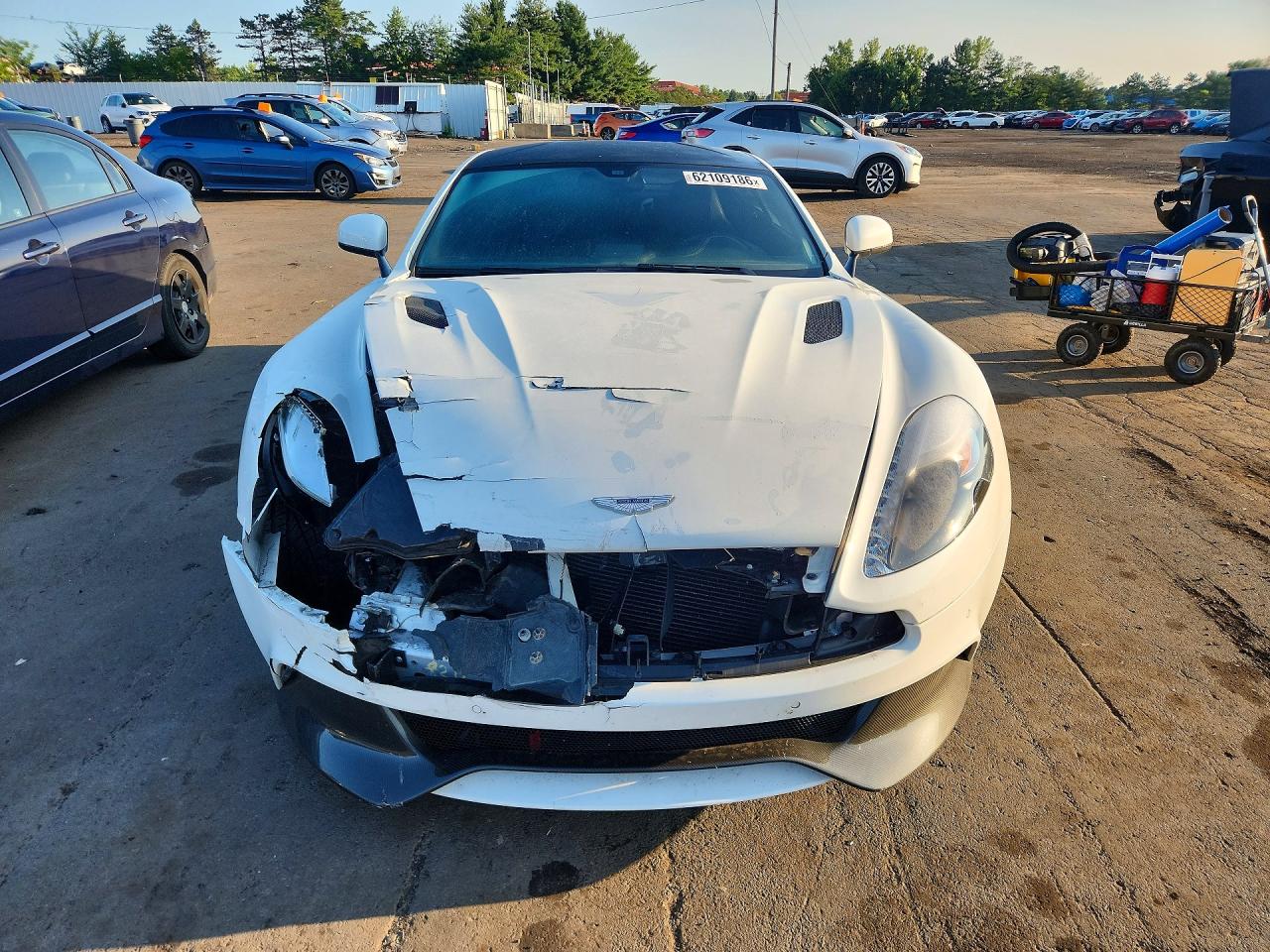 2014 Aston Martin V12 Vanquish VIN SCFLDCFP2EGJ00902 COPART salvage auction — Front End, St - Salvage Title, sold $31,750 on 2026-09-25 (photo 5)