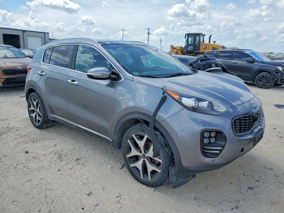 2017 Kia Sportage VIN KNDPRCA60H7264184 COPART salvage auction — MINOR DENT/SCRATCHES, Tx - Certificate Of Title, sold $2,250 on 2026-07-16 (photo 4)