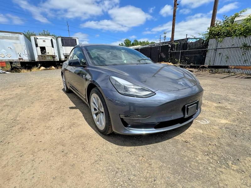 2022 Tesla Model 3 VIN 5YJ3E1EA5NF185418 COPART salvage auction — NORMAL WEAR, OR - CERTIFICATE OF TITLE (P), sold $22,300 on 2026-07-28 (photo 1)