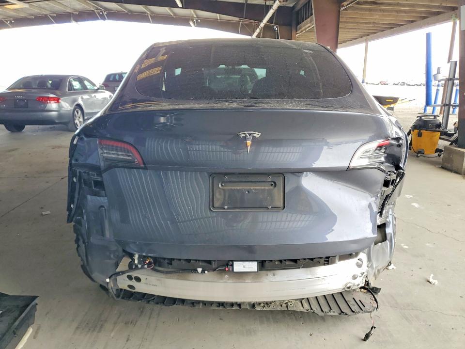 2023 Tesla Model y VIN 7SAYGDEE6PF599866 COPART salvage auction — REAR END, Ca - Salvage Certificate, sold $7,200 on 2026-07-16 (photo 6)