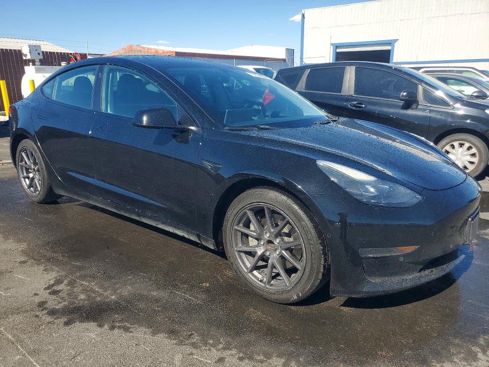 2022 Tesla Model 3 VIN 5YJ3E1EA0NF287581 COPART salvage auction — MECHANICAL, NV - CERTIFICATE OF TITLE, sold $4,750 on 2026-07-15 (photo 4)