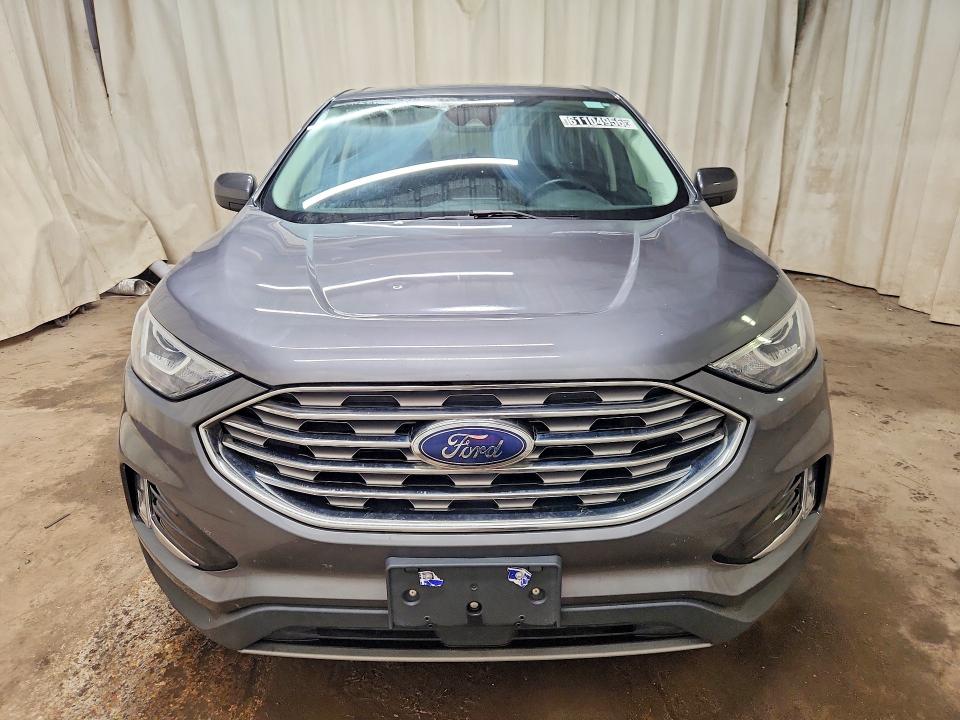 2021 Ford Edge VIN 2FMPK4J90MBA54167 COPART salvage auction — MINOR DENT/SCRATCHES, La - Certificate Of Title, sold $8,300 on 2026-07-28 (photo 5)