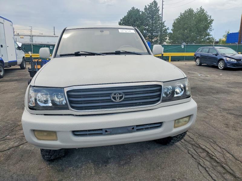 2000 Toyota Land cruiser VIN JT3HT05J2Y0096774 COPART salvage auction — MINOR DENT/SCRATCHES, Co - Dis/Dlr/Exp Only Clean Title, sold $275 on 2026-07-28 (photo 5)