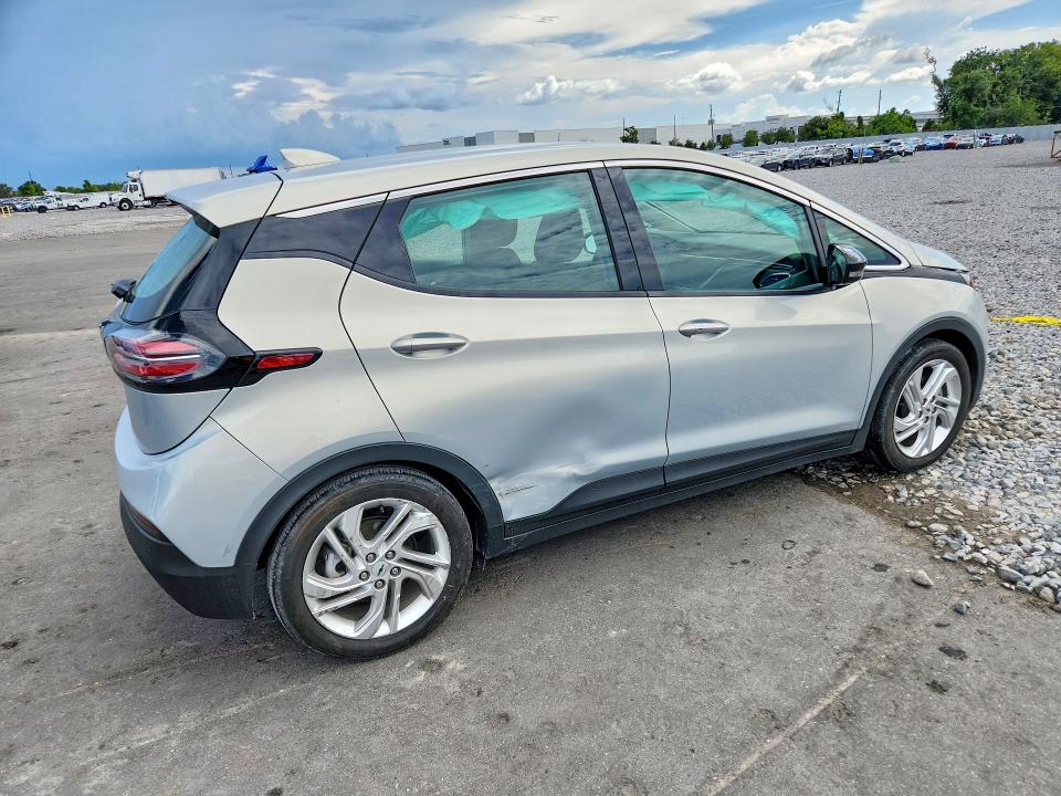 2023 Chevrolet Bolt VIN 1G1FW6S04P4201761 COPART salvage auction — SIDE, Fl - Cert Of Title Slvg Rebuildable, sold $8,700 on 2026-07-27 (photo 3)