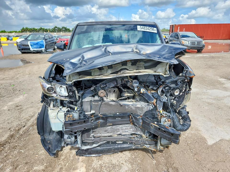 2009 Toyota Scioon VIN JTLKE50E691083996 COPART salvage auction — FRONT END, FL - CERT OF TITLE SLVG REBUILDABLE, sold $425 on 2026-07-15 (photo 5)