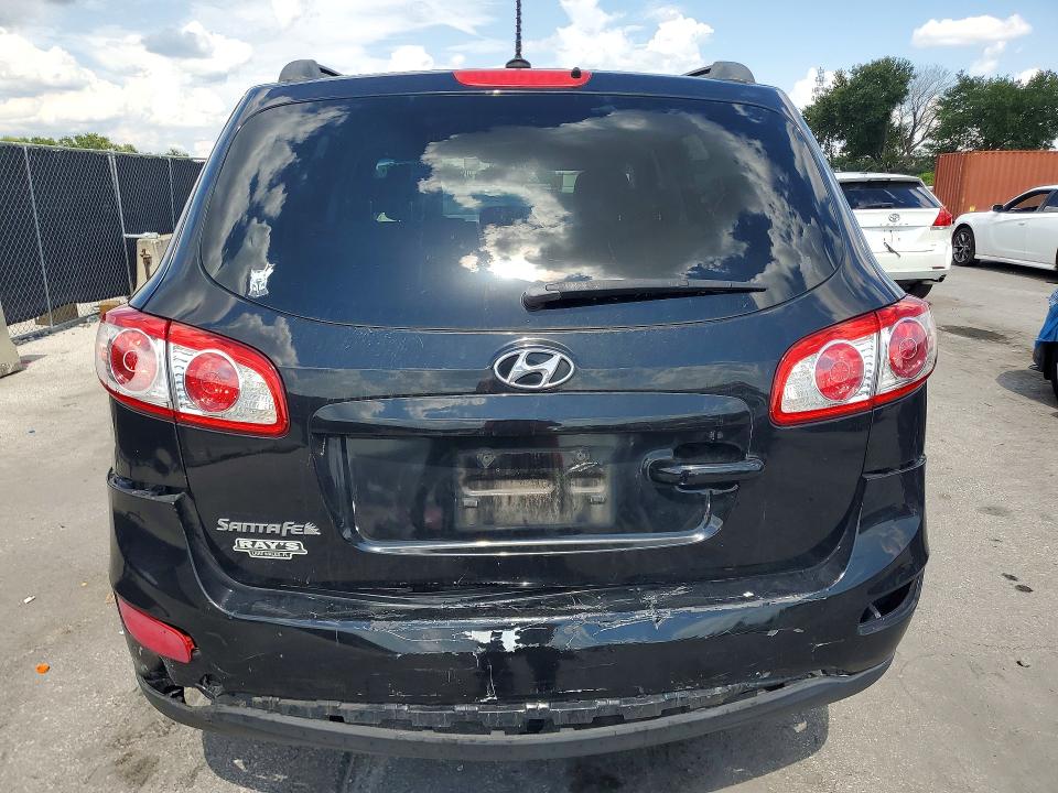 2012 Hyundai Santa fe VIN 5XYZG3AB8CG164759 COPART salvage auction — REAR END, Fl - Cert Of Title Slvg Rebuildable, sold $40 on 2026-07-30 (photo 6)