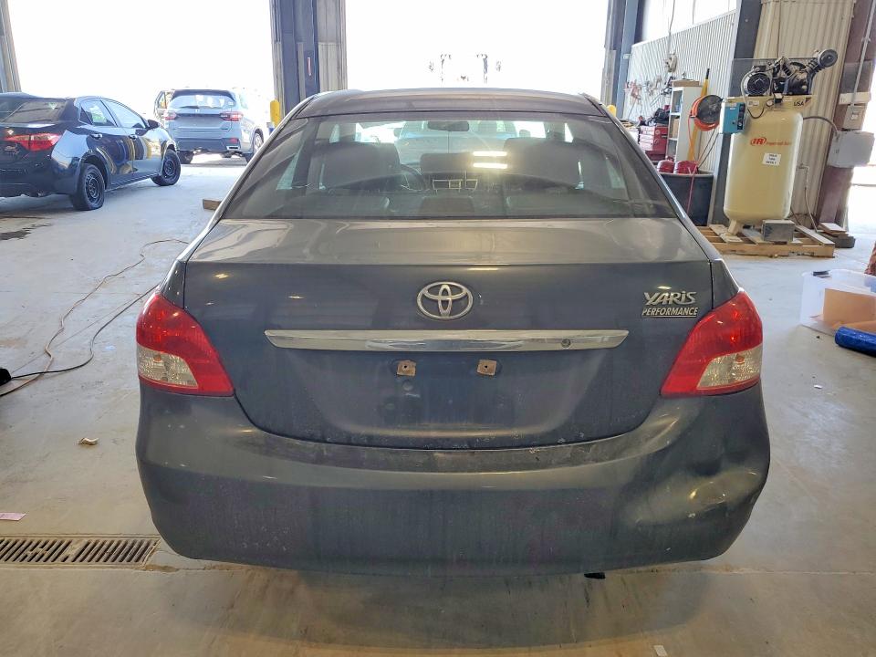2012 Toyota Yaris VIN JTDBT4K30C1421164 COPART salvage auction — REAR END, Ne - Certificate Of Title, sold $725 on 2026-07-14 (photo 6)