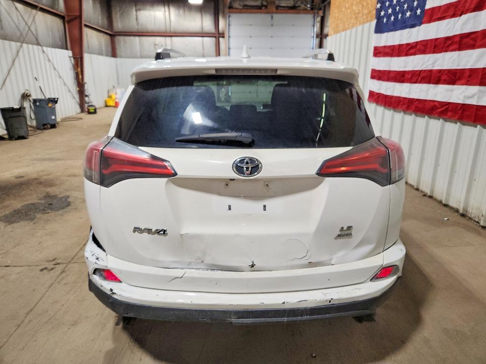 2016 Toyota Rav4 VIN 2T3BFREV6GW465470 COPART salvage auction — ALL OVER, AK - CERT OF VEH TITLE-RECONSTRUCTE, sold $30 on 2026-07-21 (photo 6)