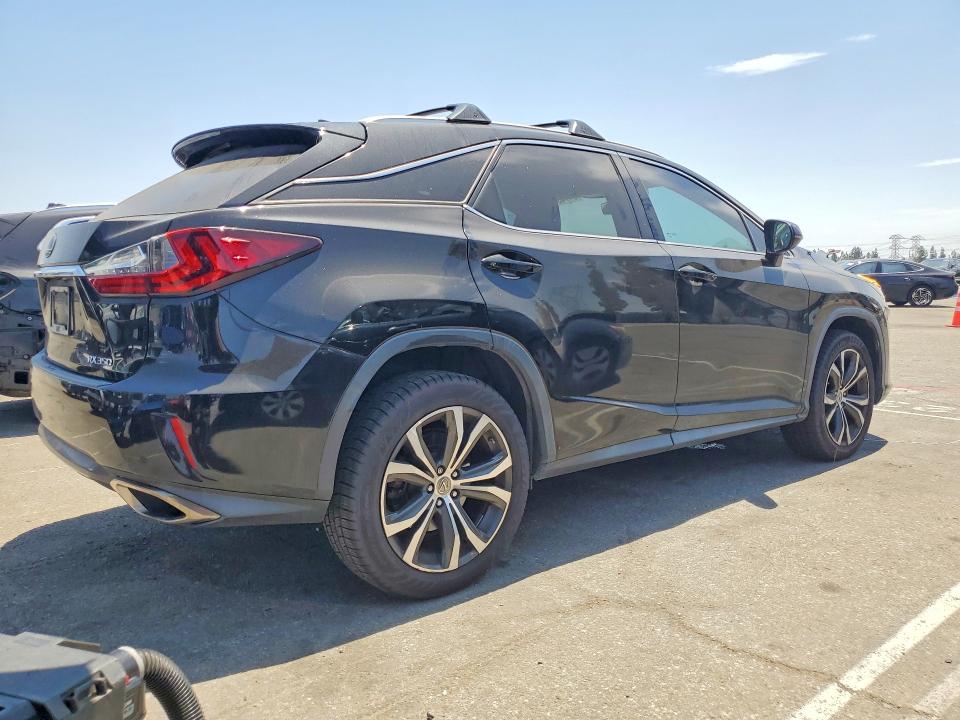 2016 Lexus Rx VIN 2T2BZMCAXGC007480 COPART salvage auction — NORMAL WEAR, CA - DIS/DLR/EXP ONLY CLEAN TITLE, sold $12,200 on 2026-09-03 (photo 3)
