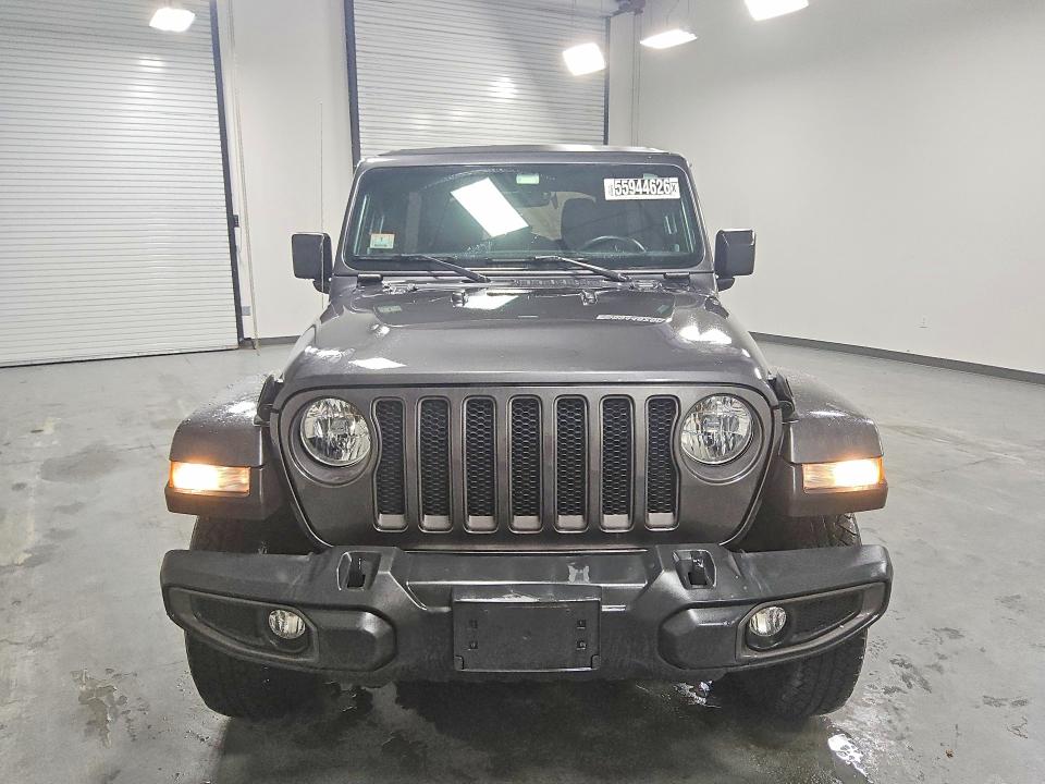 2021 Jeep Wrangler unlimited VIN 1C4HJXDN6MW738421 COPART salvage auction — NORMAL WEAR, Ma - Certificate Of Title, sold $20,250 on 2026-08-27 (photo 5)