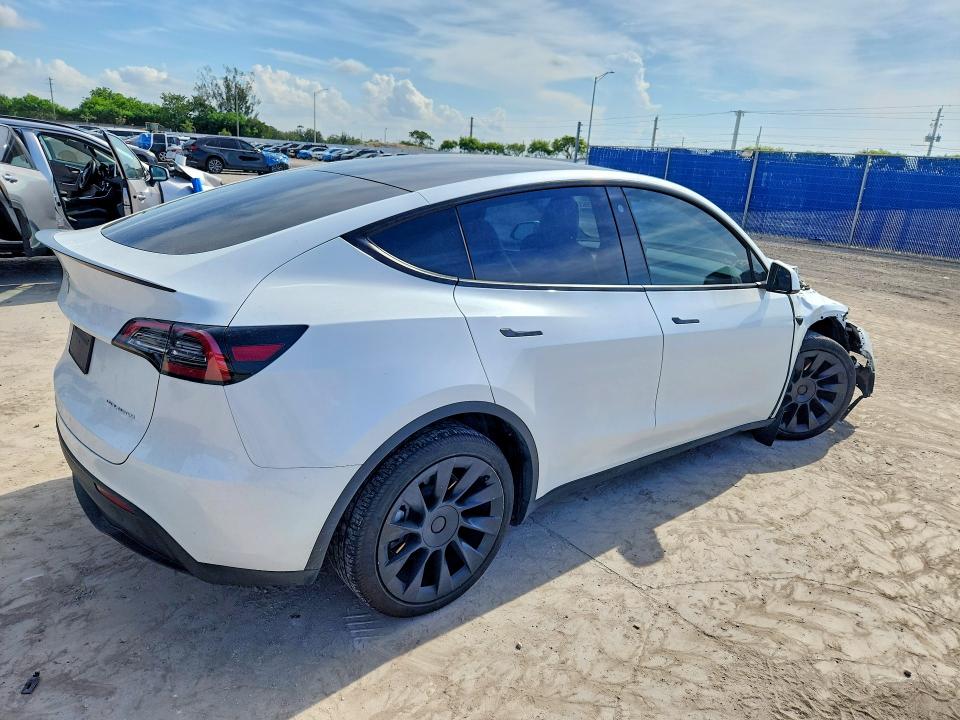 2023 Tesla Model y VIN 7SAYGDEE5PA092096 COPART salvage auction — FRONT END, Fl - Cert Of Title Slvg Rebuildable, sold $13,600 on 2026-07-15 (photo 3)