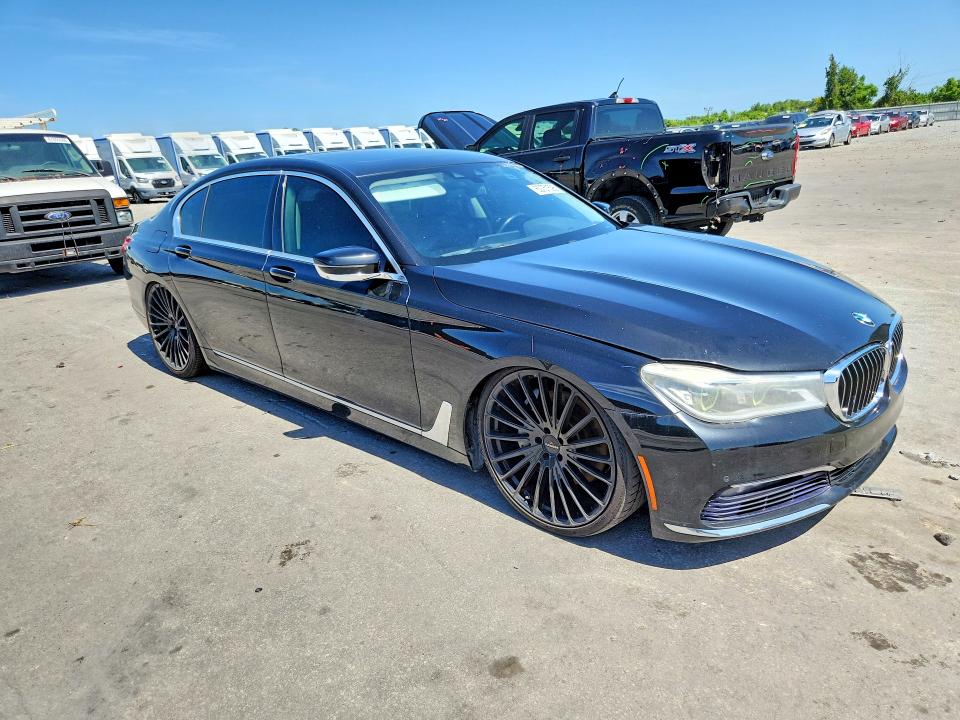 2016 BMW 7er VIN WBA7F2C57GG419252 COPART salvage auction — MINOR DENT/SCRATCHES, Fl - Certificate Of Title, sold $7,300 on 2026-07-23 (photo 4)