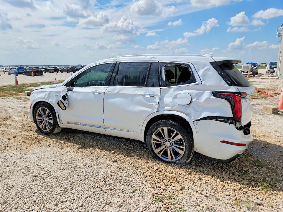 2024 Cadillac Xt6 VIN 1GYKPCRS7RZ719288 COPART salvage auction — SIDE, Tx - Salvage Vehicle Title, sold $2,550 on 2026-07-09 (photo 2)