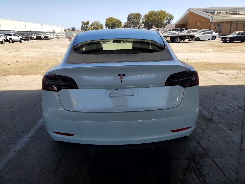 2023 Tesla Model 3 VIN 5YJ3E1EA5PF580153 COPART salvage auction — MINOR DENT/SCRATCHES, CA - CERTIFICATE OF TITLE (P), sold $15,200 on 2026-07-20 (photo 6)