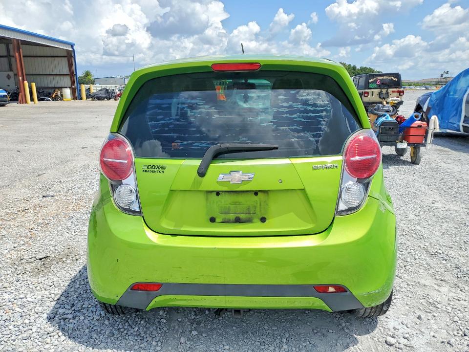 2015 Chevrolet VIN KL8CB6S98FC809123 COPART salvage auction — SIDE, Fl - Certificate Of Title, sold $525 on 2026-07-17 (photo 6)