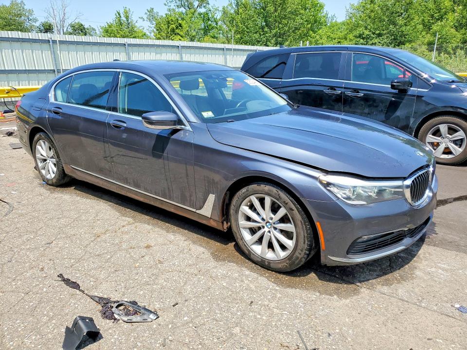 2018 BMW 7er VIN WBA7E4C54JGV23896 COPART salvage auction — MINOR DENT/SCRATCHES, Mi - Certificate Of Title, sold $3,900 on 2026-07-31 (photo 4)