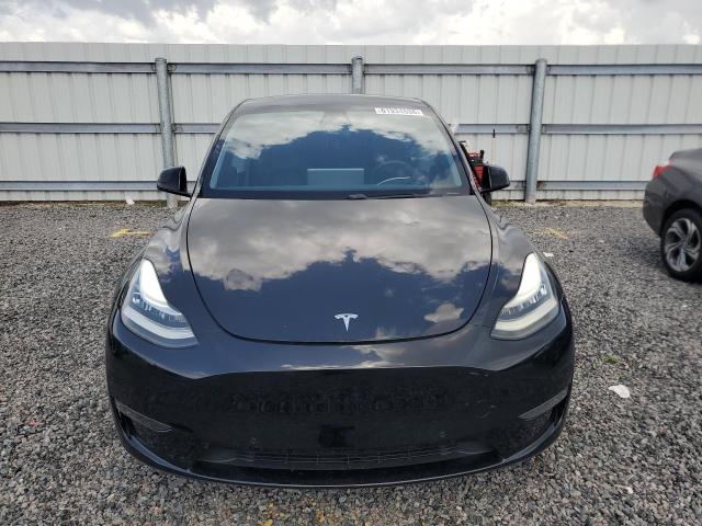 2020 Tesla Cybertruck VIN 5YJYGDEE2LF029838 COPART salvage auction — REAR END, Fl - Certificate Of Destruction, sold $6,700 on 2026-07-31 (photo 5)