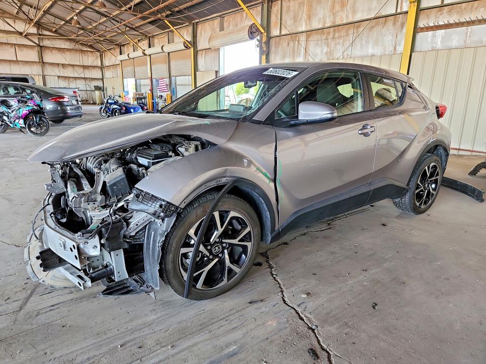 2019 Toyota C-hr VIN JTNKHMBXXK1047984 COPART salvage auction — FRONT END, AZ - CERT OF TITLE - SALVAGE, sold $4,150 on 2026-07-27 (photo 1)