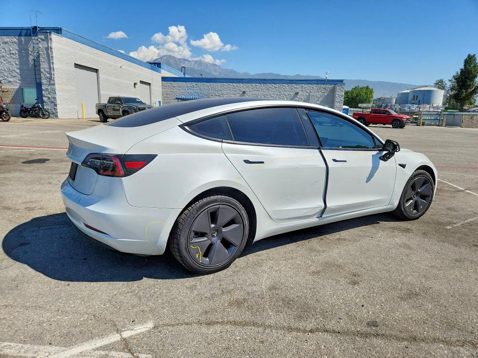 2023 Tesla Model 3 VIN 5YJ3E1EA4PF606046 COPART salvage auction — SIDE, Ca - Salvage Certificate, sold $250 on 2026-07-21 (photo 3)