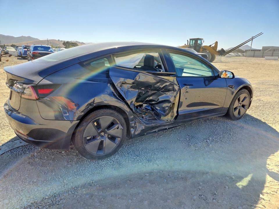2023 Tesla Model 3 VIN 5YJ3E1EA6PF417513 COPART salvage auction — SIDE, Ca - Salvage Certificate, sold $6,900 on 2026-07-14 (photo 3)
