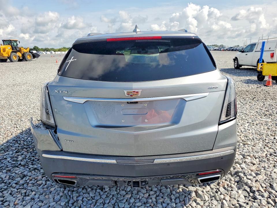 2023 Cadillac Xt5 VIN 1GYKNGRS1PZ118159 COPART salvage auction — SIDE, Fl - Certificate Of Destruction, sold $7,300 on 2026-08-18 (photo 6)